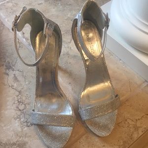 Silver high heel shoes